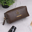 Brown mini travel pouch