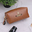 Tan mini travel pouch
