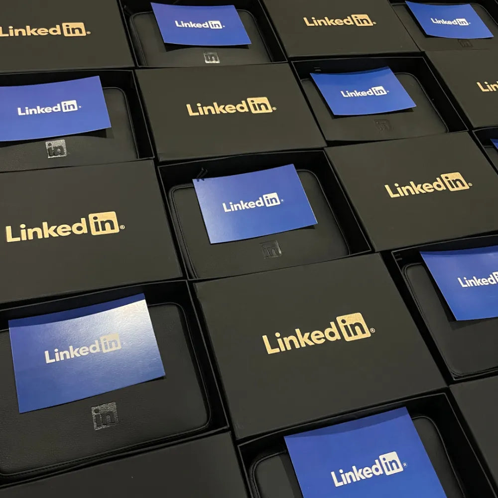 LinkedIn-branded gift boxes with blue LinkedIn cards