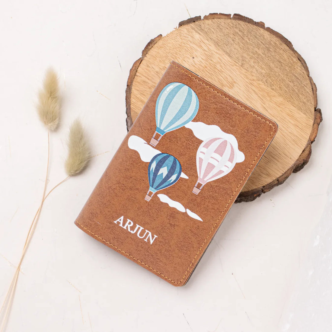 Personalised tan passport cover with balloon design