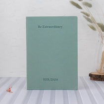 Green journal with inspirational quote