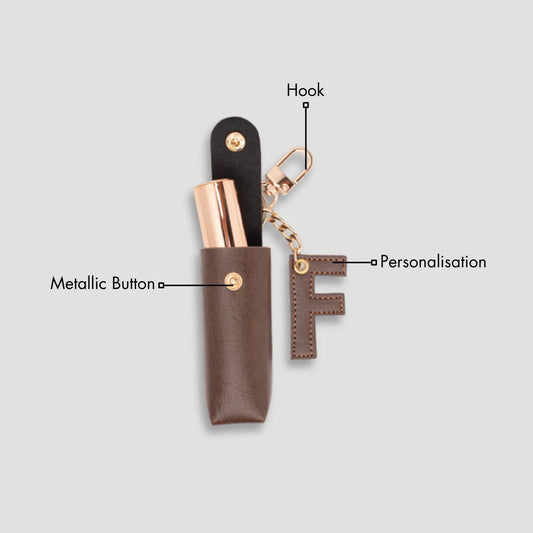 Brown keychain pouch with a lipstick inside