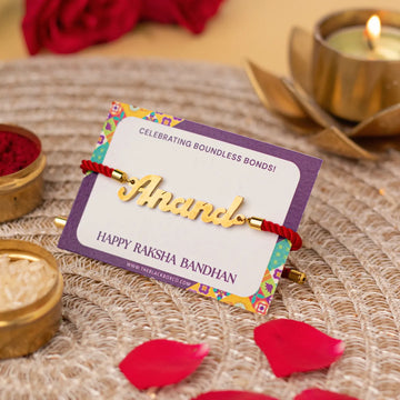 Metal Rakhi with red thread