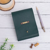 Green notepad with modern design
