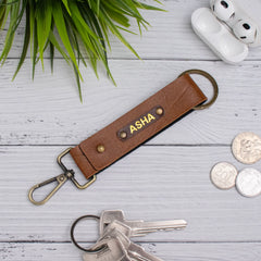 Tan two-sided keychain