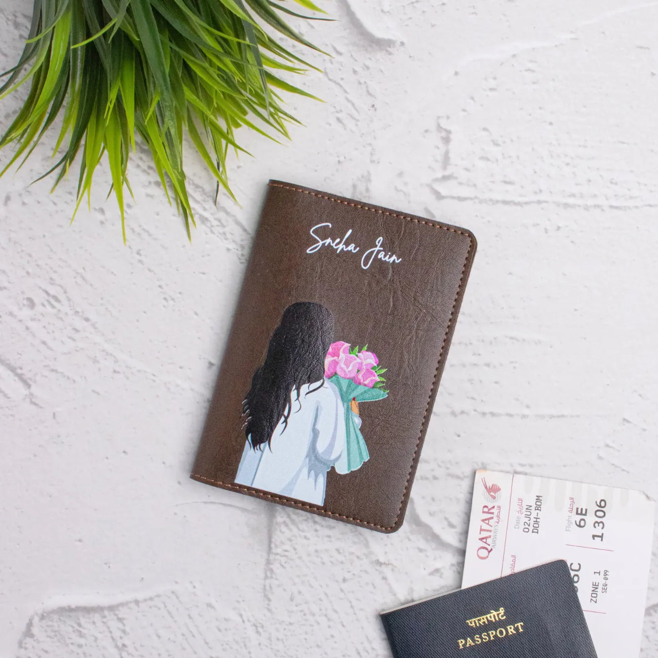 Brown travel pouch with pink flower 