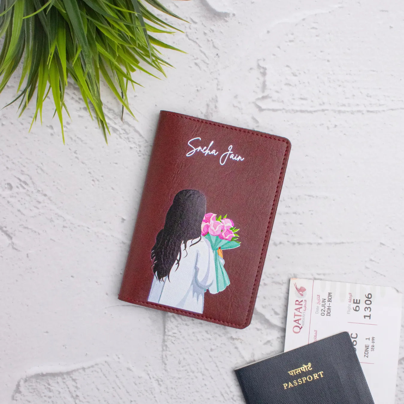 Maroon travel pouch with pink flower 