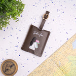 Brown personalised travel tag on map backdrop