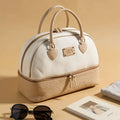 Beige weekender bag on the table