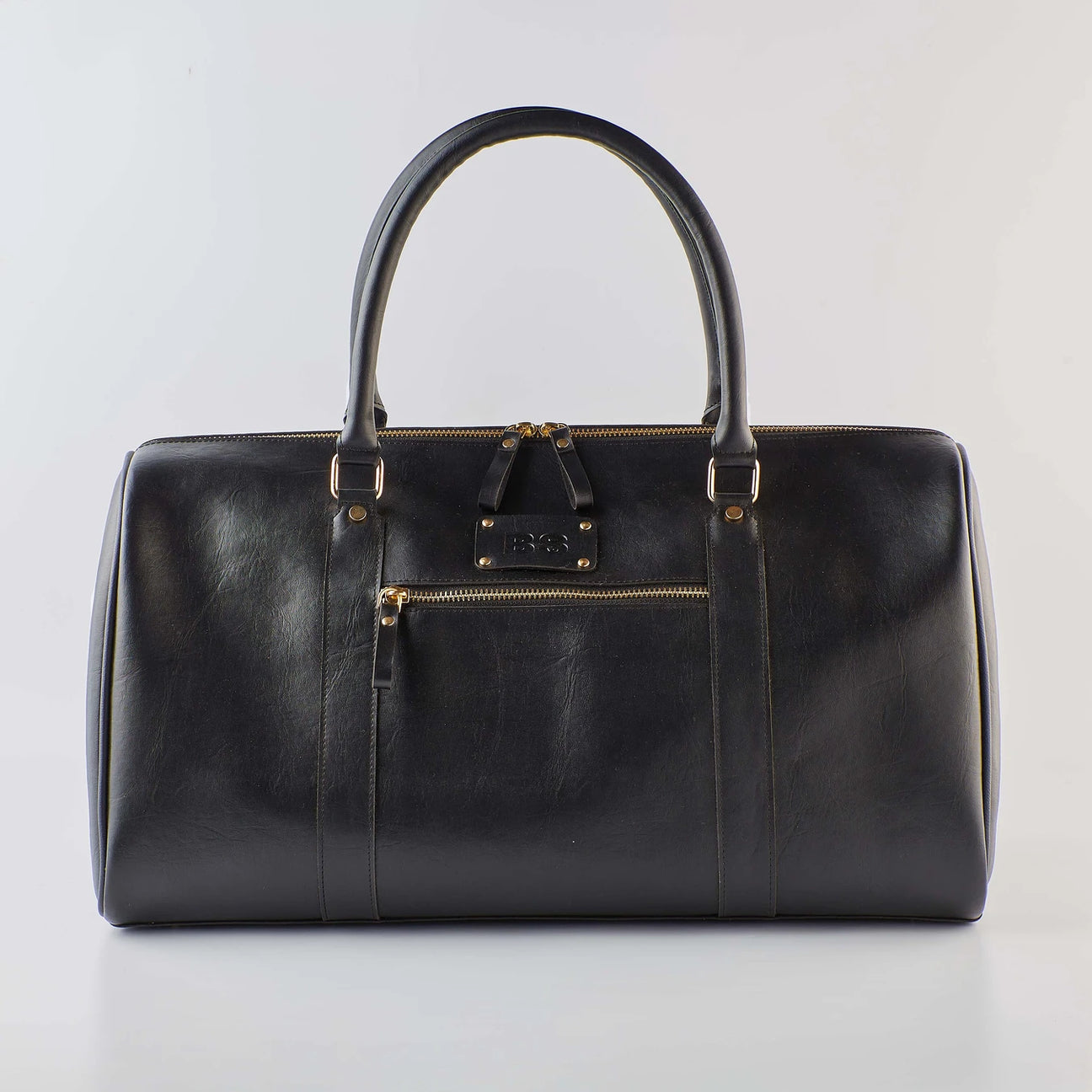 Black duffel bag with handles and front zipper