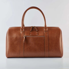 Tan duffel bag with handles and front zipper