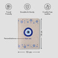 Beige travel wallet with evil eye