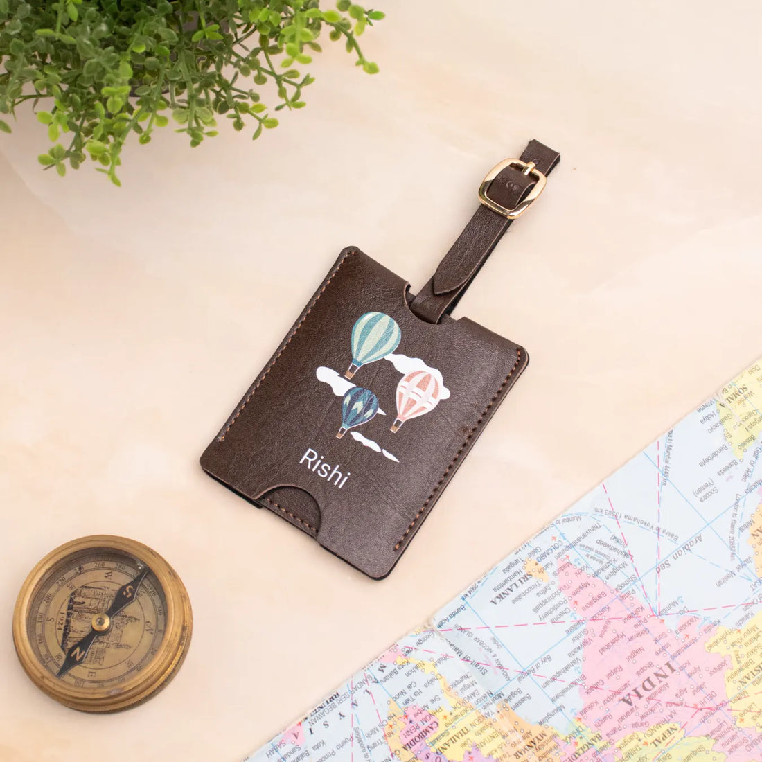 Brown personalised luggage tag with size details