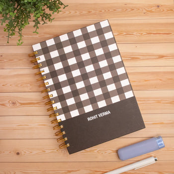 Checkmate notebook with name 'Rohit Verma'