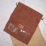 Tan leather shoe bag