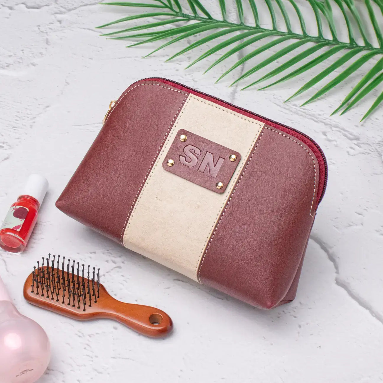 Maroon leather makeup pouch