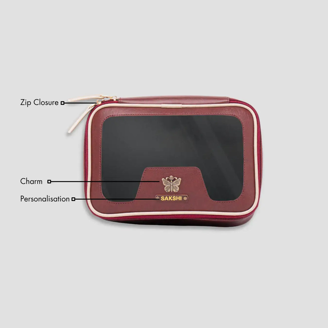 Maroon leather vanity pouch with features
