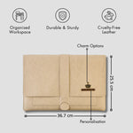 Beige laptop with arrow initials