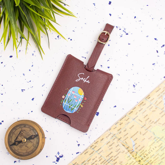 Maroon personalised travel tag on map backdrop